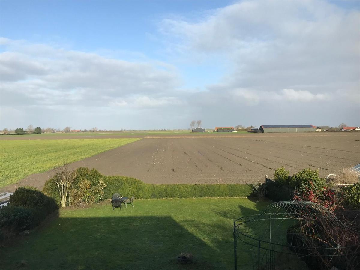 T Huuske Tuinappartement Met Fantastisch Uitzicht, Nabij Zee Zonnemaire Exterior foto